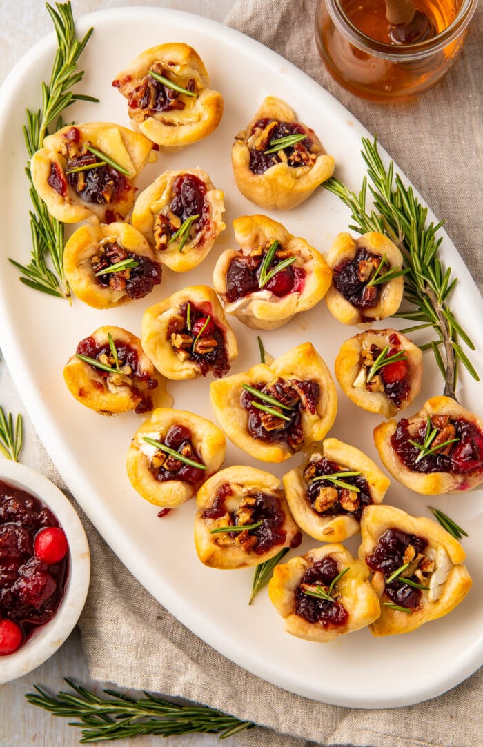 Overhead view of a platter of cranberry brie bites