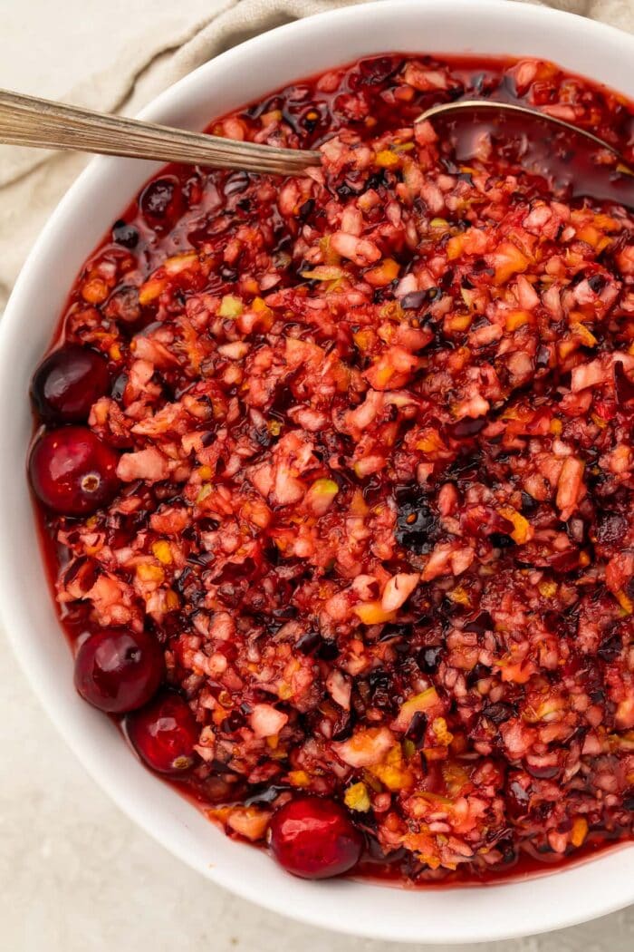 Overhead, slightly zoomed out photo of cranberry relish in a large white bowl