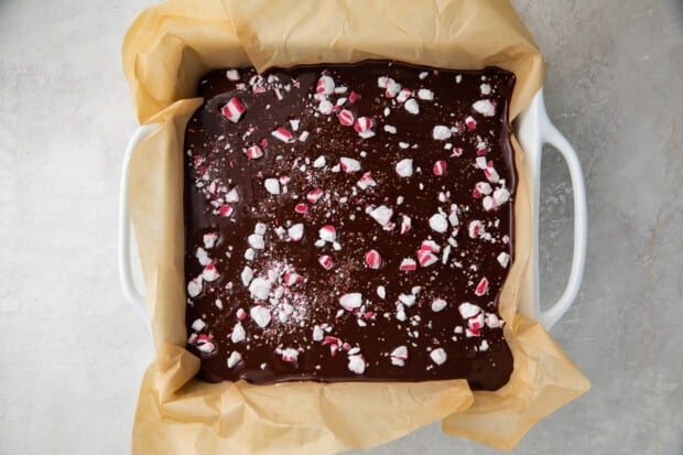 Keto peppermint brownies in baking dish lined with parchment paper