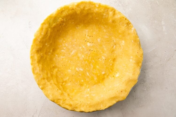 Baked keto pie crust in pie plate