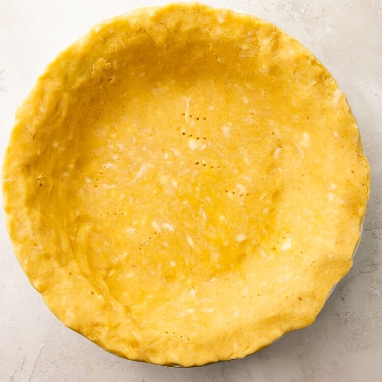 Baked keto pie crust in pie plate