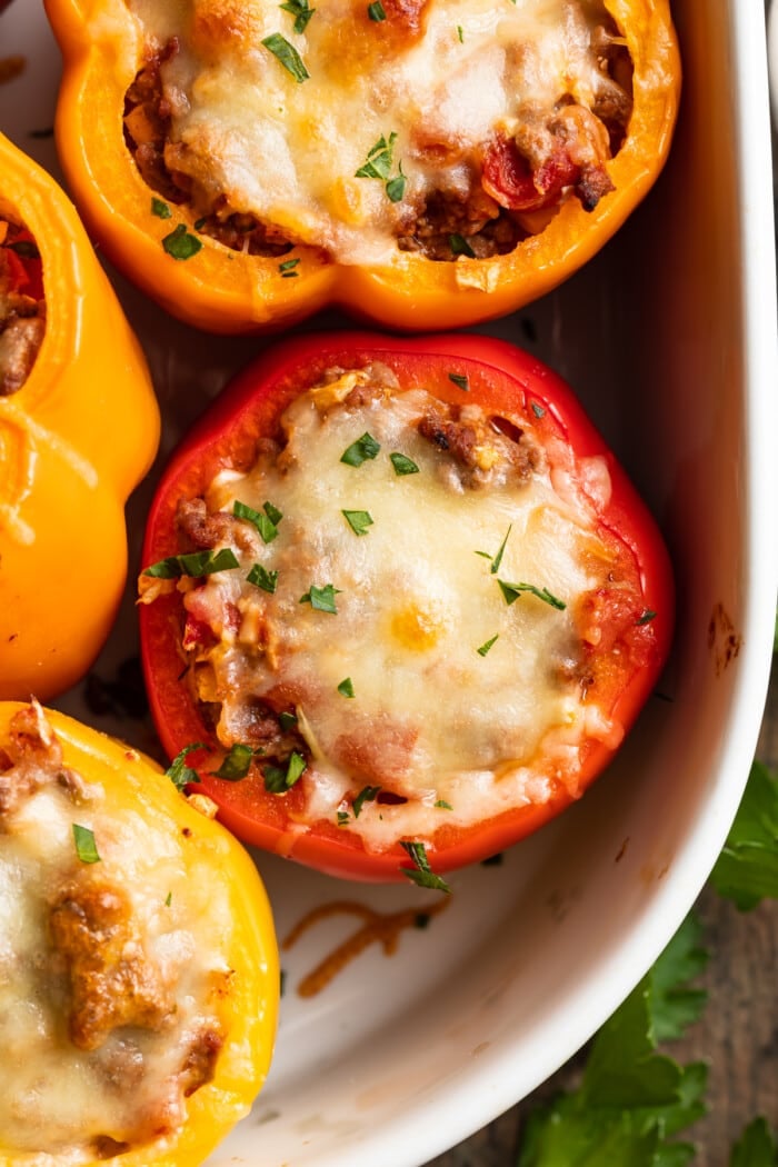 overhead image of keto stuffed peppers in a baking dish