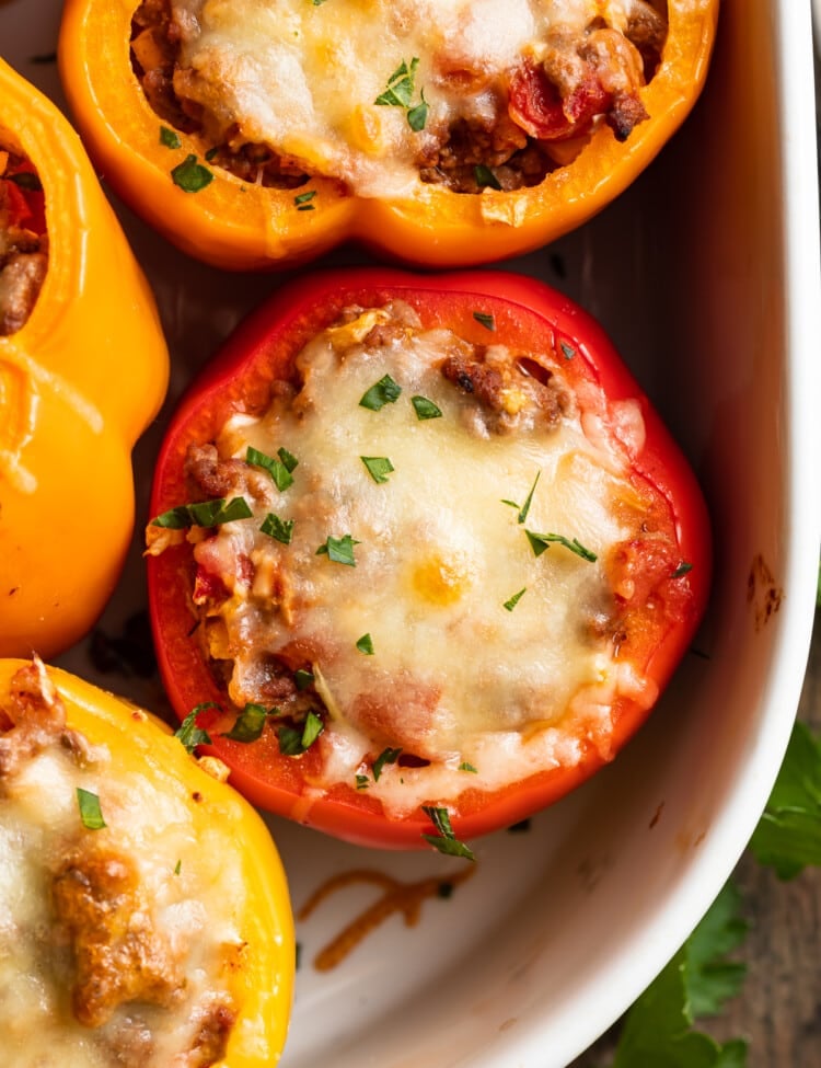 overhead image of keto stuffed peppers in a baking dish