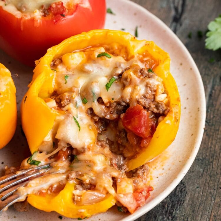 keto stuffed peppers on a plate with a fork
