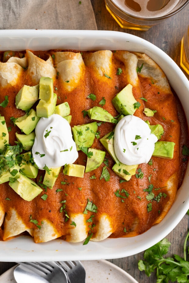 overhead image of vegan enchiladas in a casserole dish