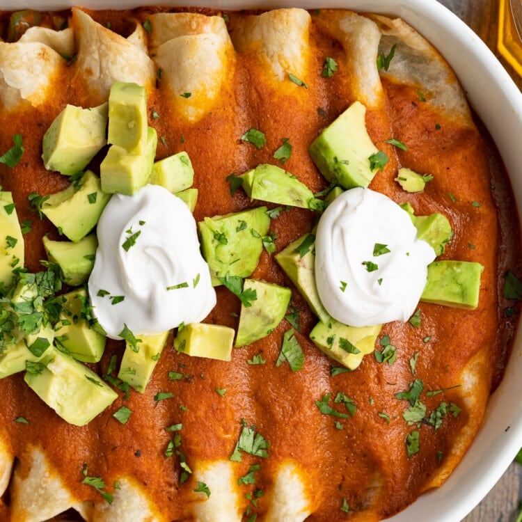 overhead image of vegan enchiladas in a casserole dish