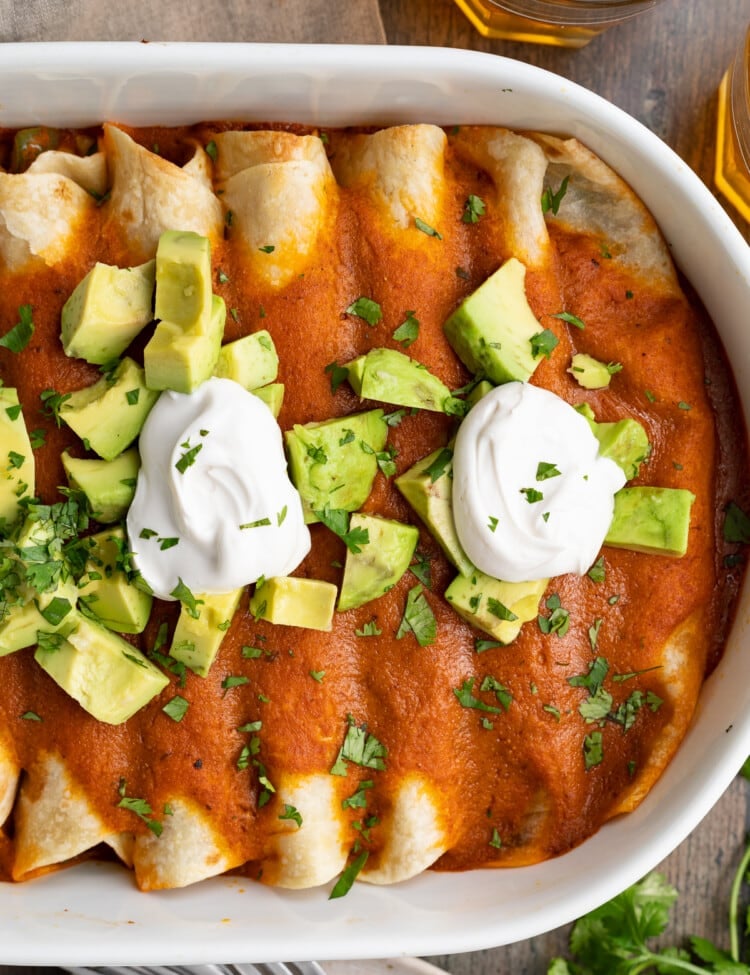 overhead image of vegan enchiladas in a casserole dish