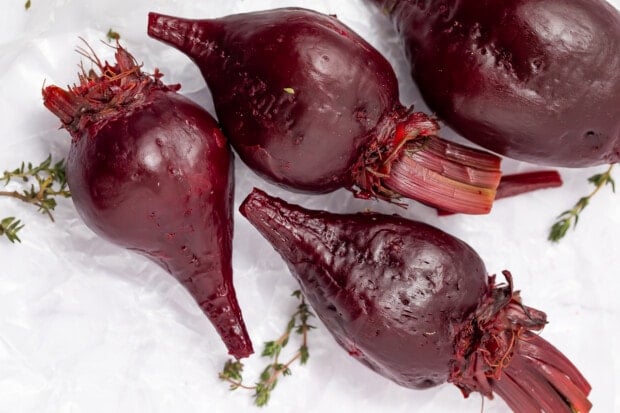 Cooked beets on cutting board