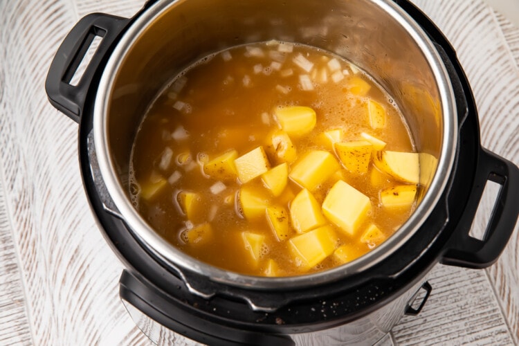 Potatoes and chicken stock in Instant Pot