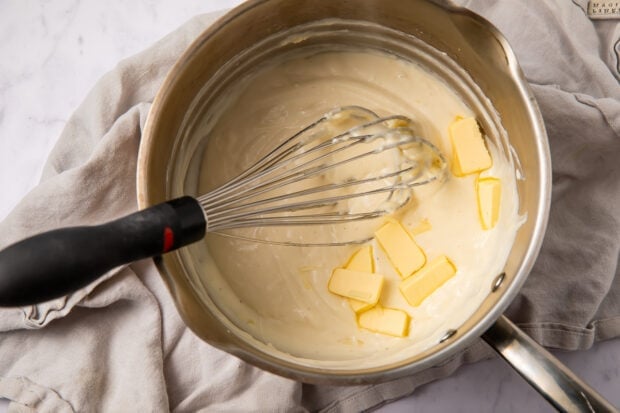 Butter whisked into mornay sauce in large saucepan