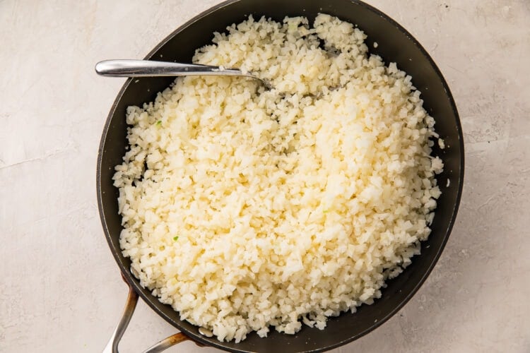 Cauliflower rice in large skillet