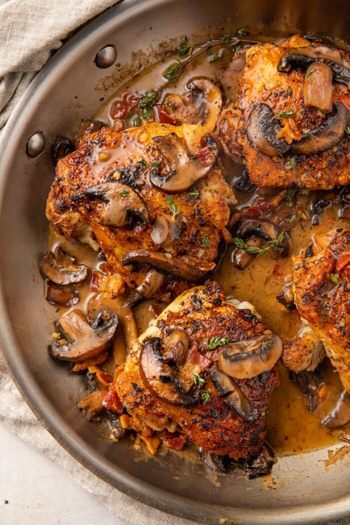 Whole30 Mushroom bacon chicken thighs in a skillet
