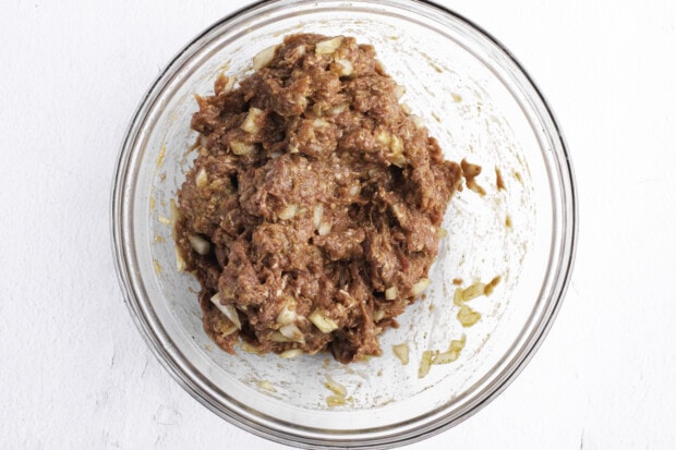 Ground beef and onion mixture in large bowl