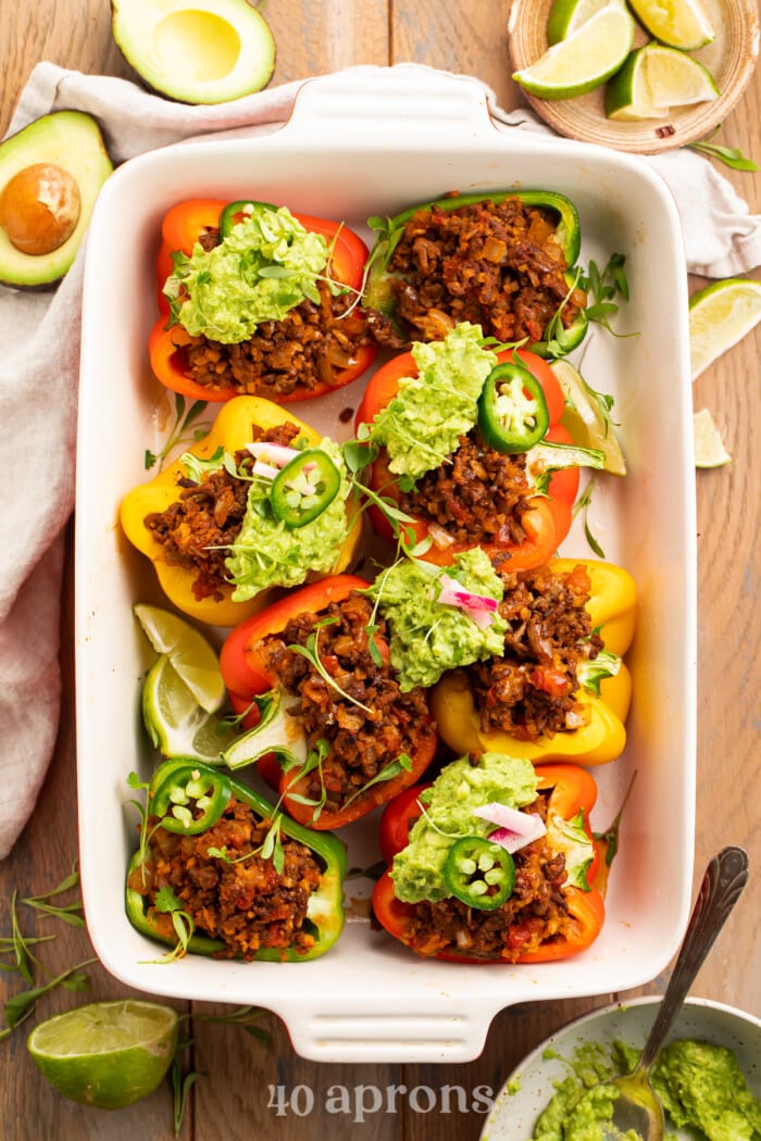 Overhead view of Whole30 taco stuffed peppers in a baking dish