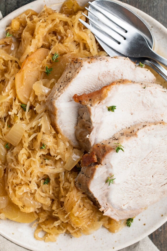close-up image of pork and sauerkraut on a plate