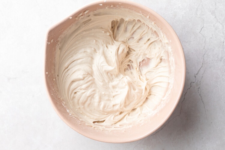 Cream cheese frosting in large mixing bowl.