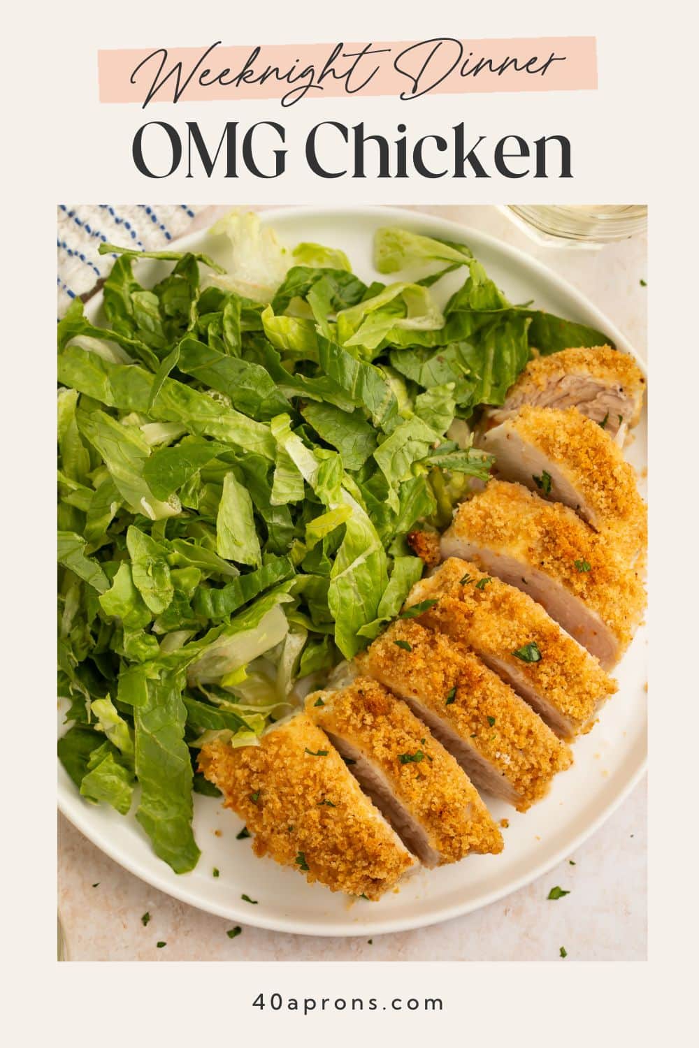 Pinterest graphic with text "Weeknight Dinner OMG Chicken" above photo of sliced breaded chicken and salad.