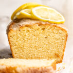 Close-up of lemon drizzle cake taken from end to show inside texture of cake.
