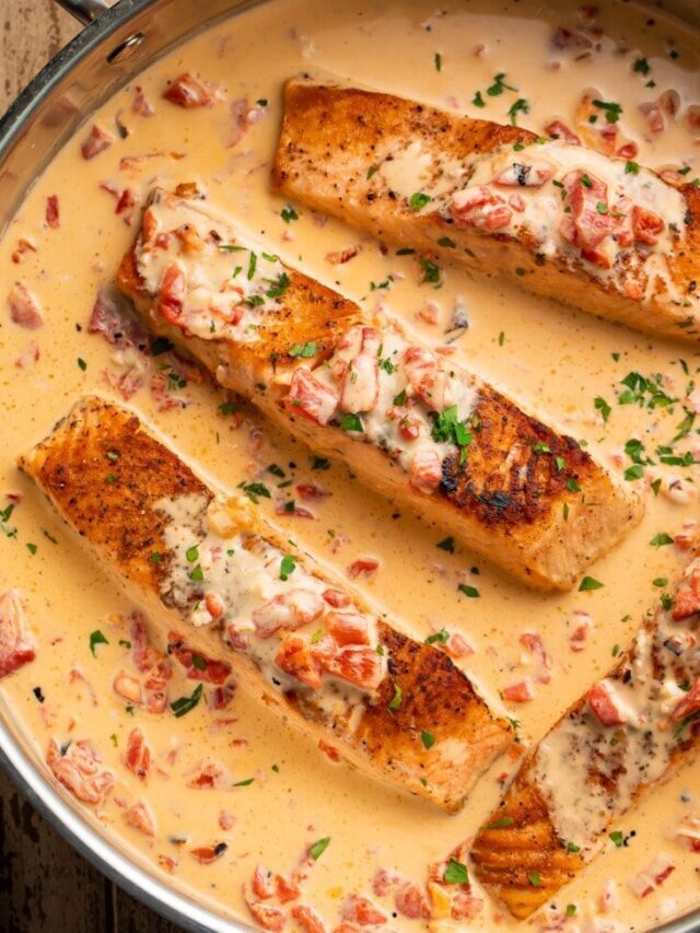 Pan-Seared Salmon In A Creamy Red Pepper Parmesan Sauce