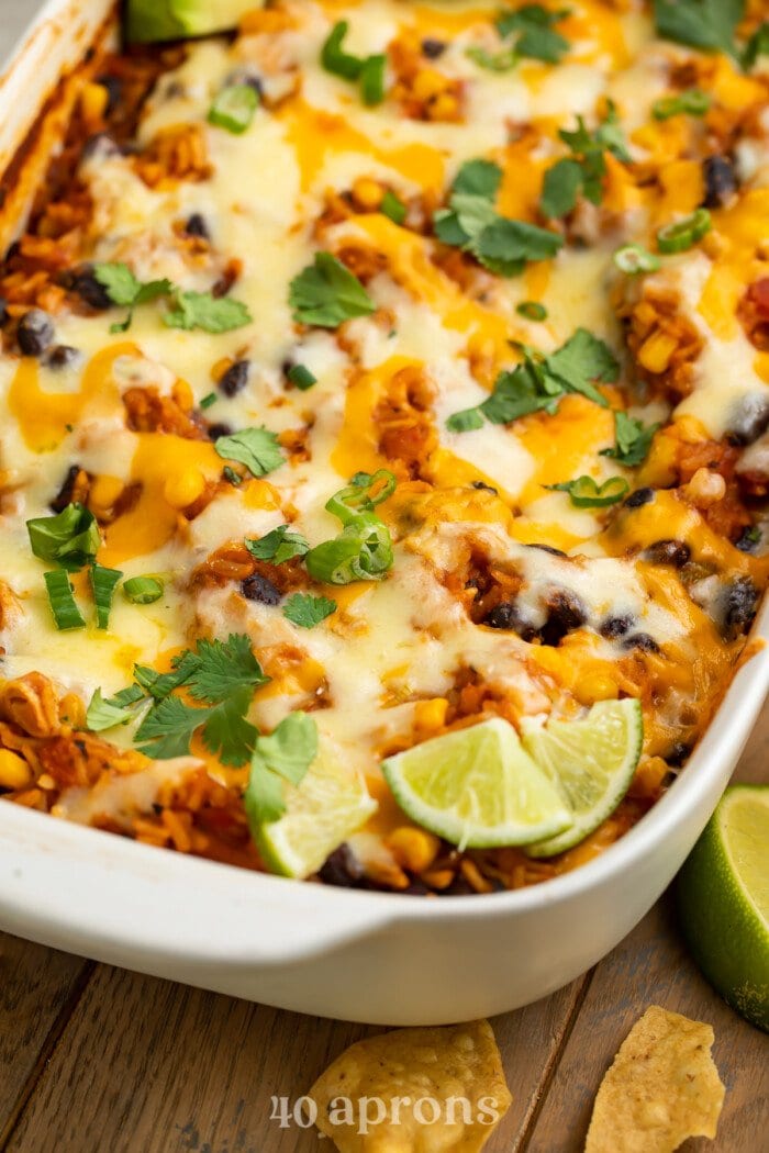 Angled view of Mexican rice casserole taken from the corner of the casserole dish.