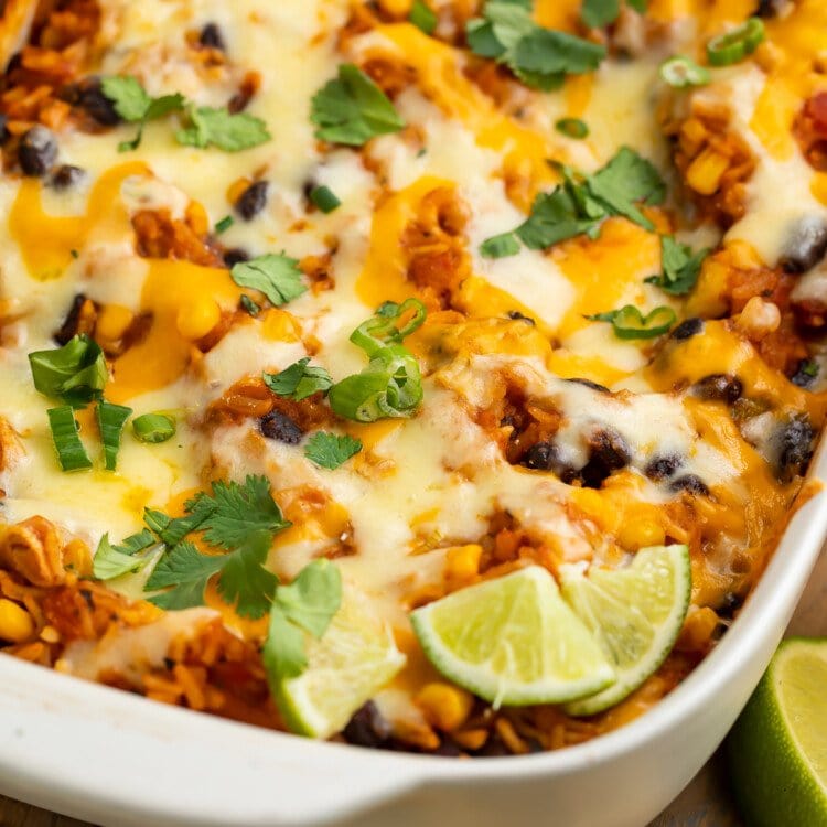 Angled view of Mexican rice casserole taken from the corner of the casserole dish.