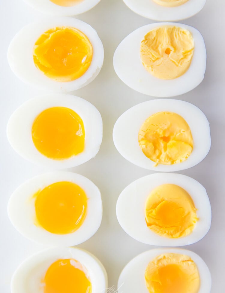 Hard and soft boiled eggs cut in half.