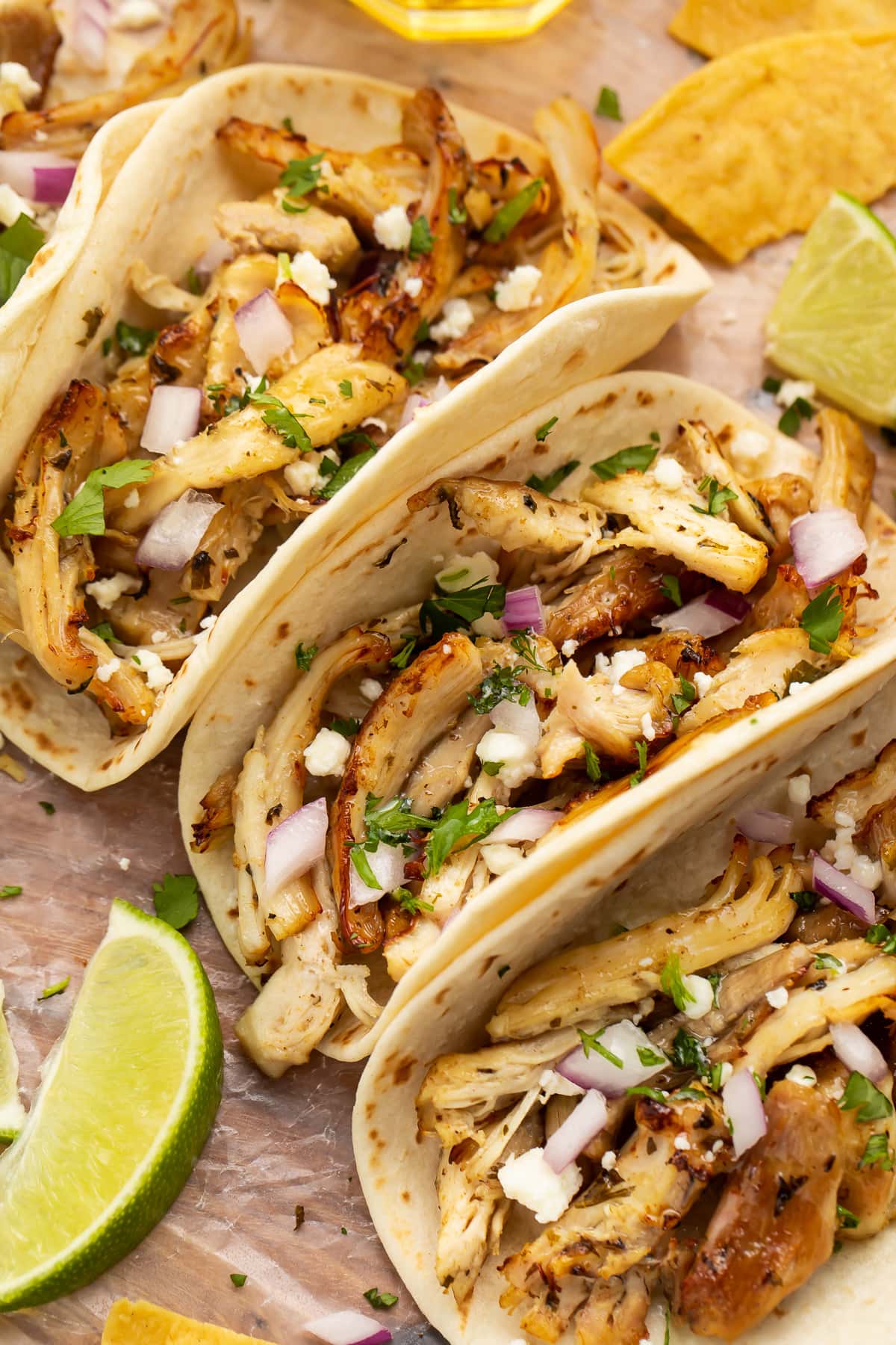 Close-up of a chicken carnitas taco with Instant Pot chicken carnitas.