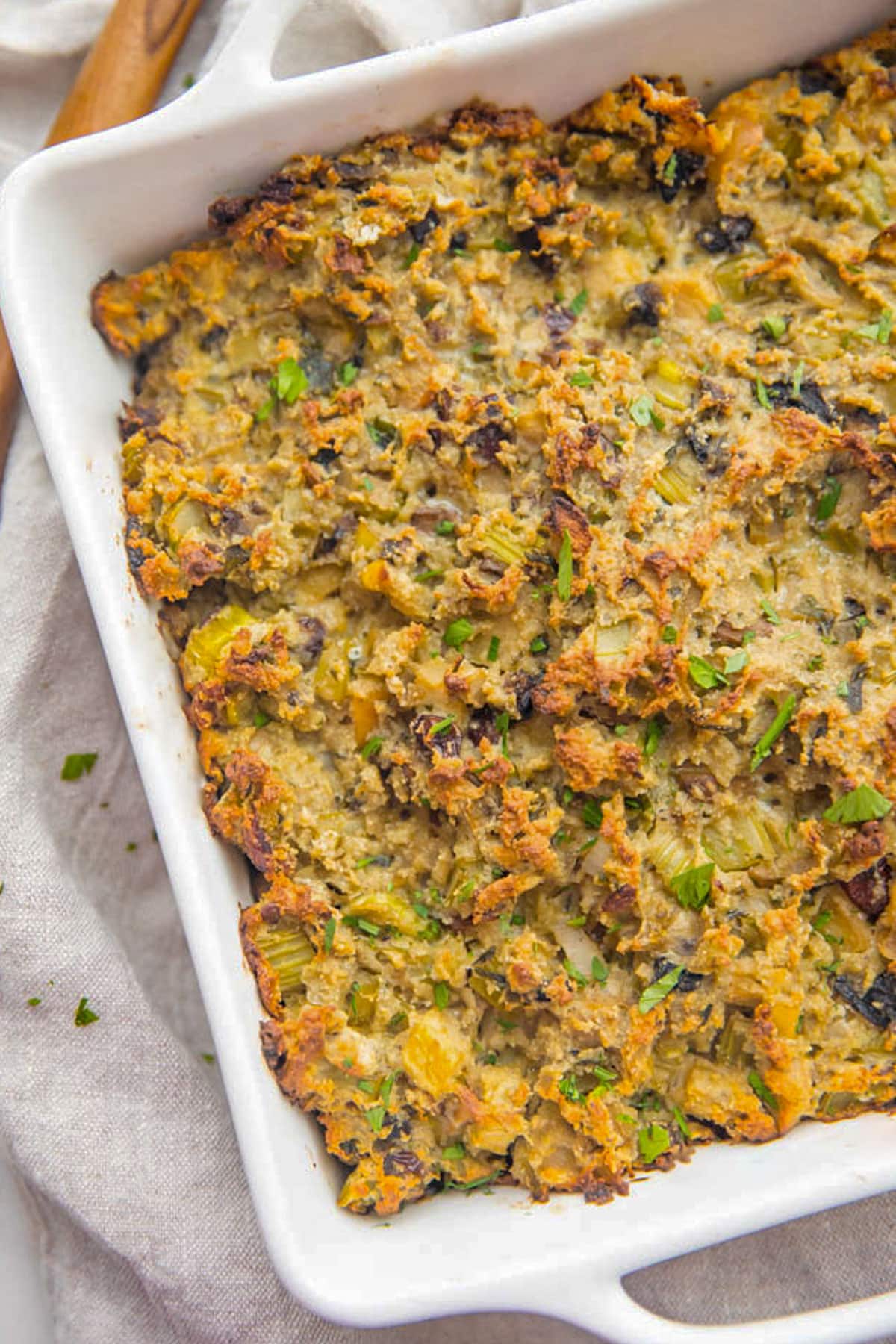 A white square casserole dish holding the best paleo stuffing.
