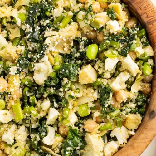 A close-up of a bowl of my favorite detox salad, loaded with chickpeas, quinoa, feta cheese, and more.