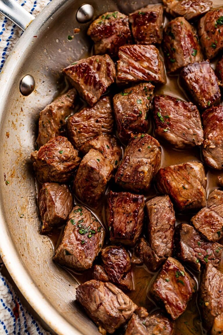 Gorgeous rich garlic butter steak bites in a large skillet.