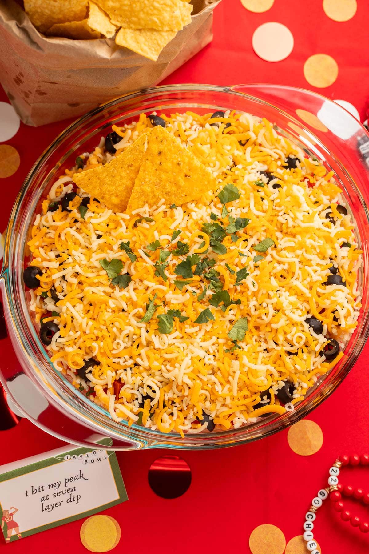 Marry me 7-layer dip in a large glass bowl.