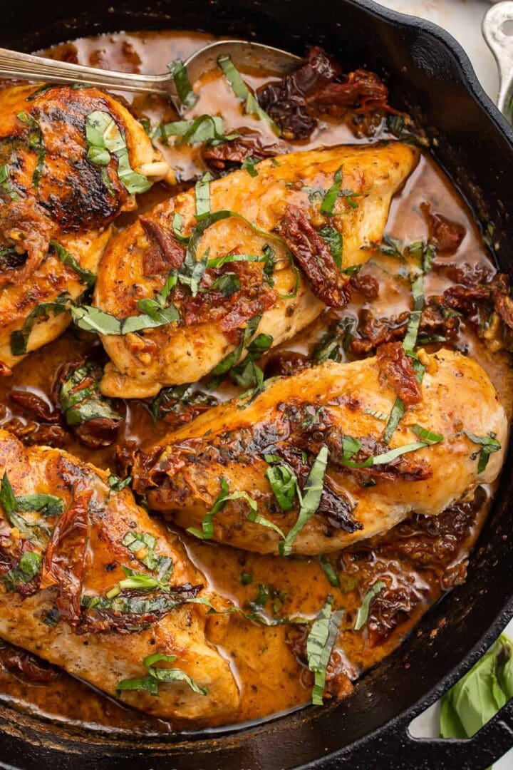 Whole30 marry me chicken in a cast iron skillet.