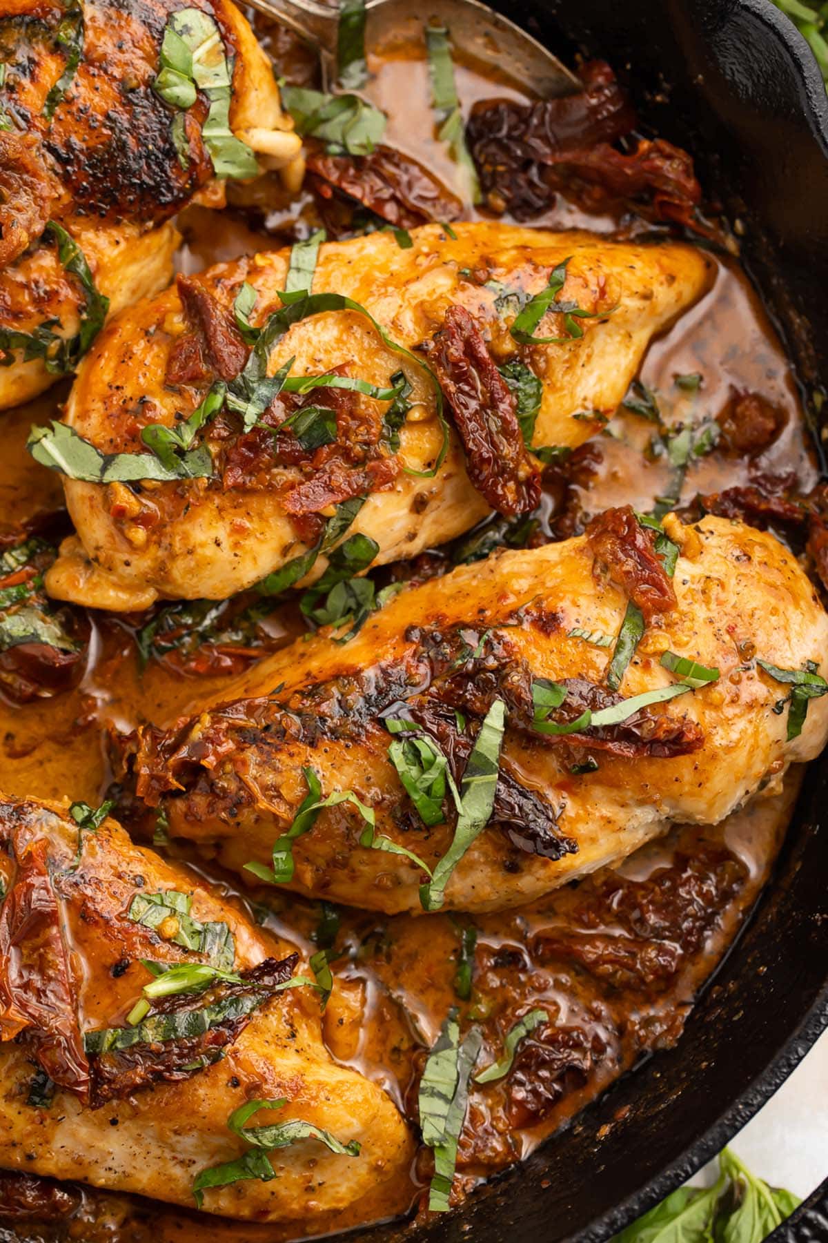 Whole30 marry me chicken in a cast iron skillet.