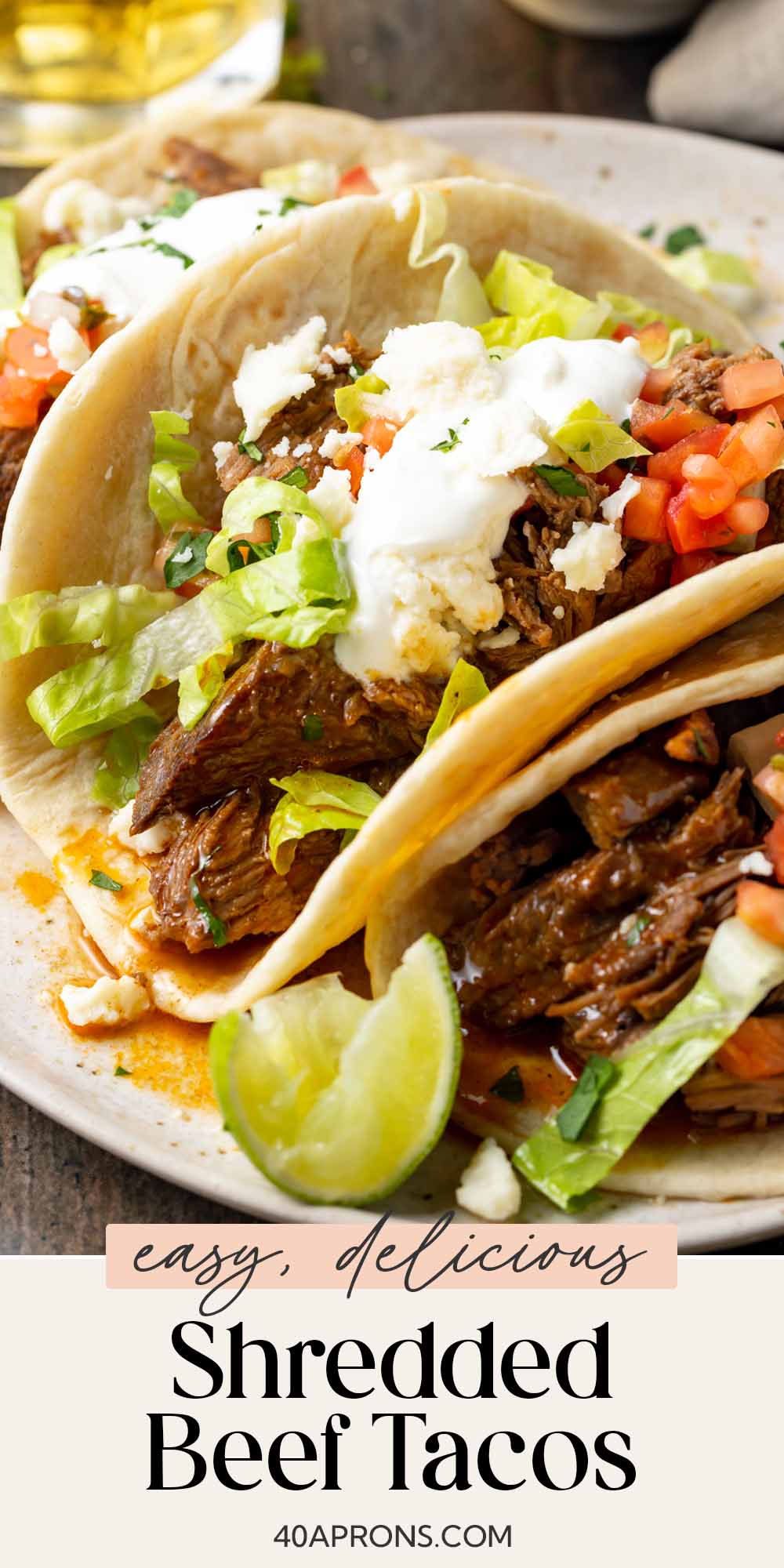 Pin graphic for shredded beef tacos.