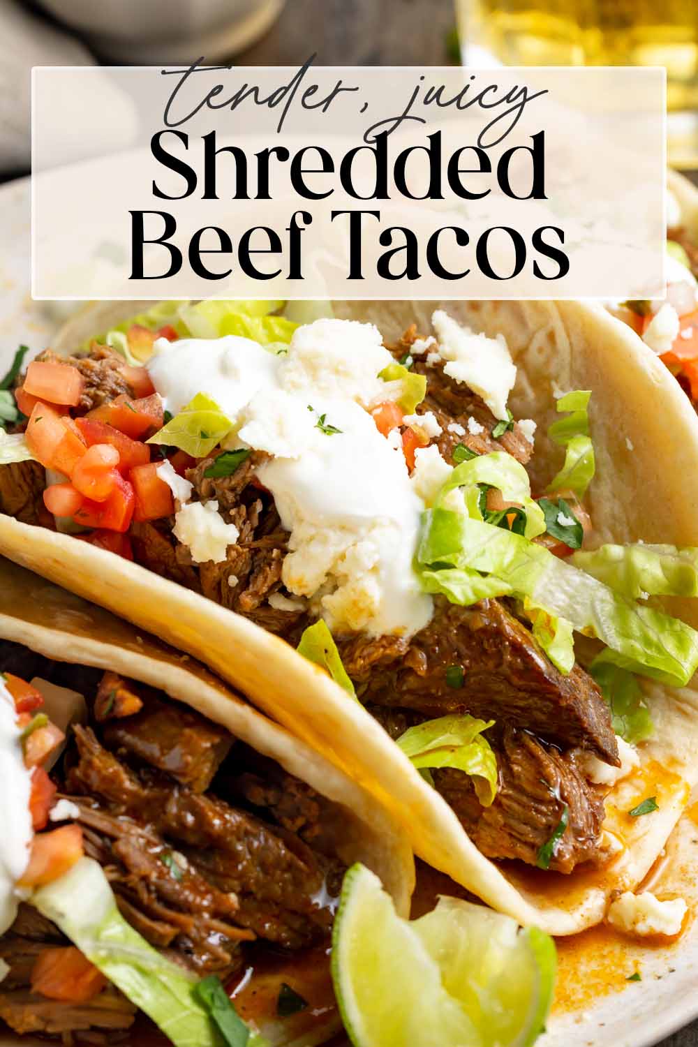 Pin graphic for shredded beef tacos.
