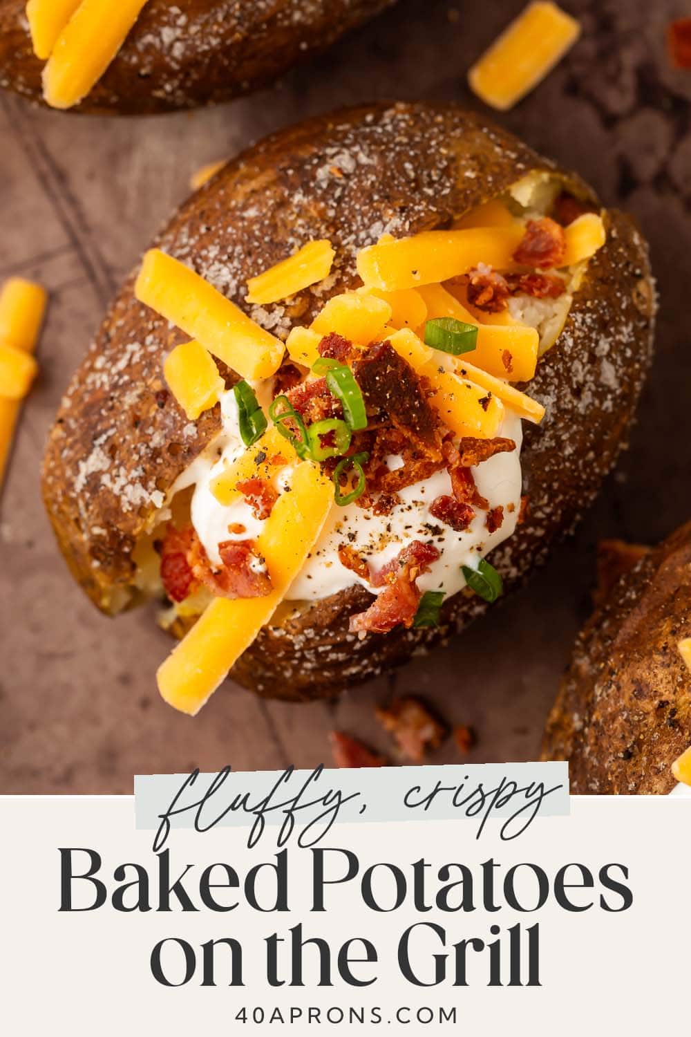 Pin graphic for baked potatoes on the grill.