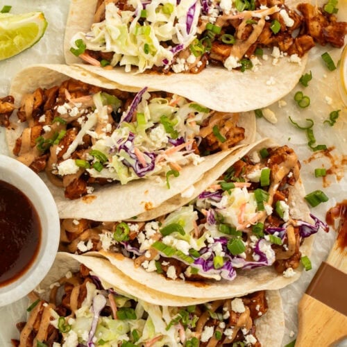 BBQ chicken tacos arranged on a platter.