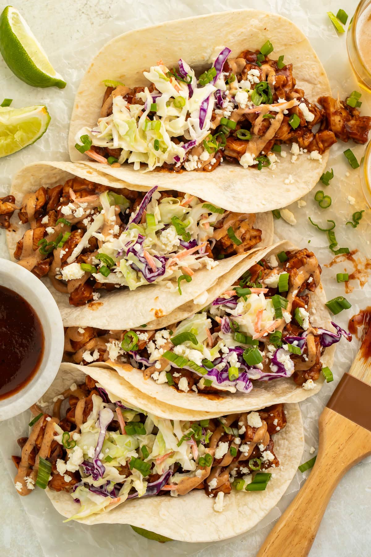 BBQ chicken tacos arranged on a platter.