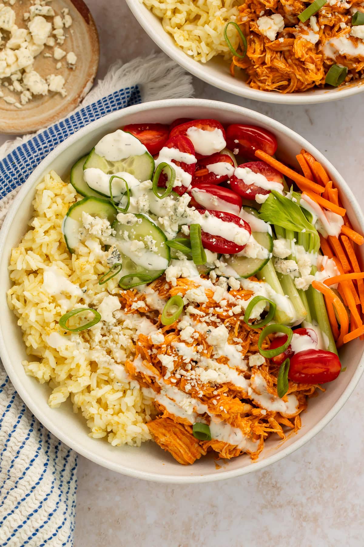 Close-up of Instant Pot shredded buffalo chicken with visible texture and sauce coating