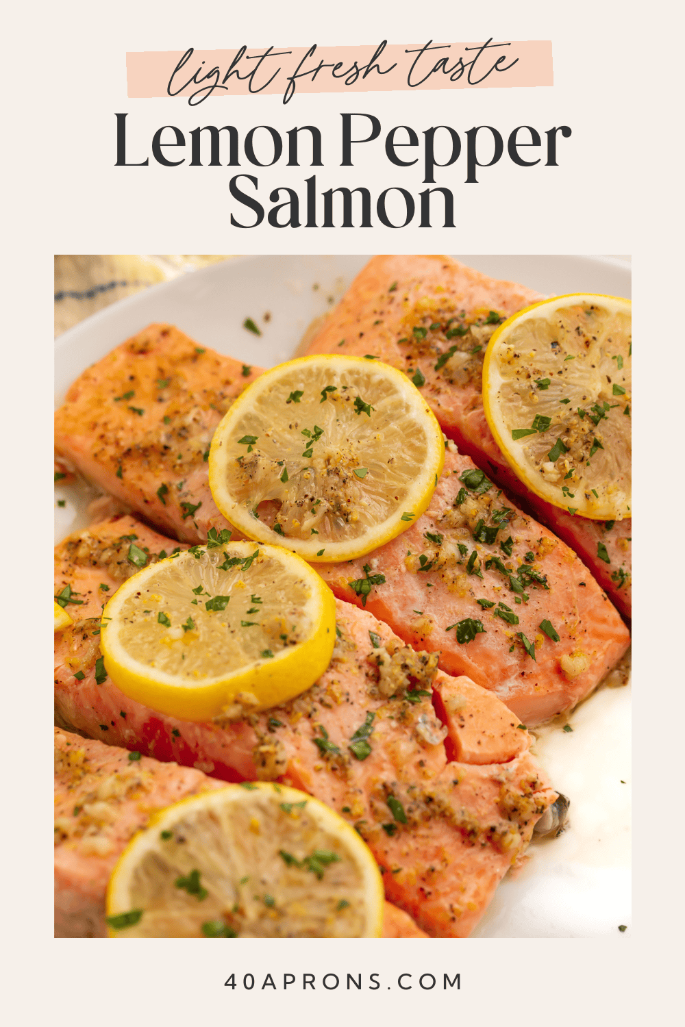 Close up of seasoned salmon fillet with lemon slice showing golden pepper coating