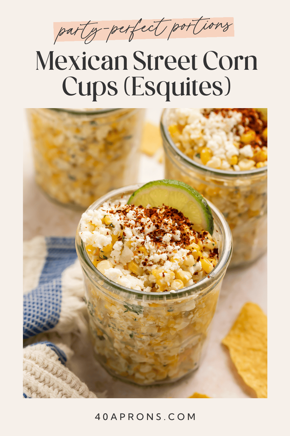 Overhead view of multiple corn-filled jars with lime wedges and cilantro garnish