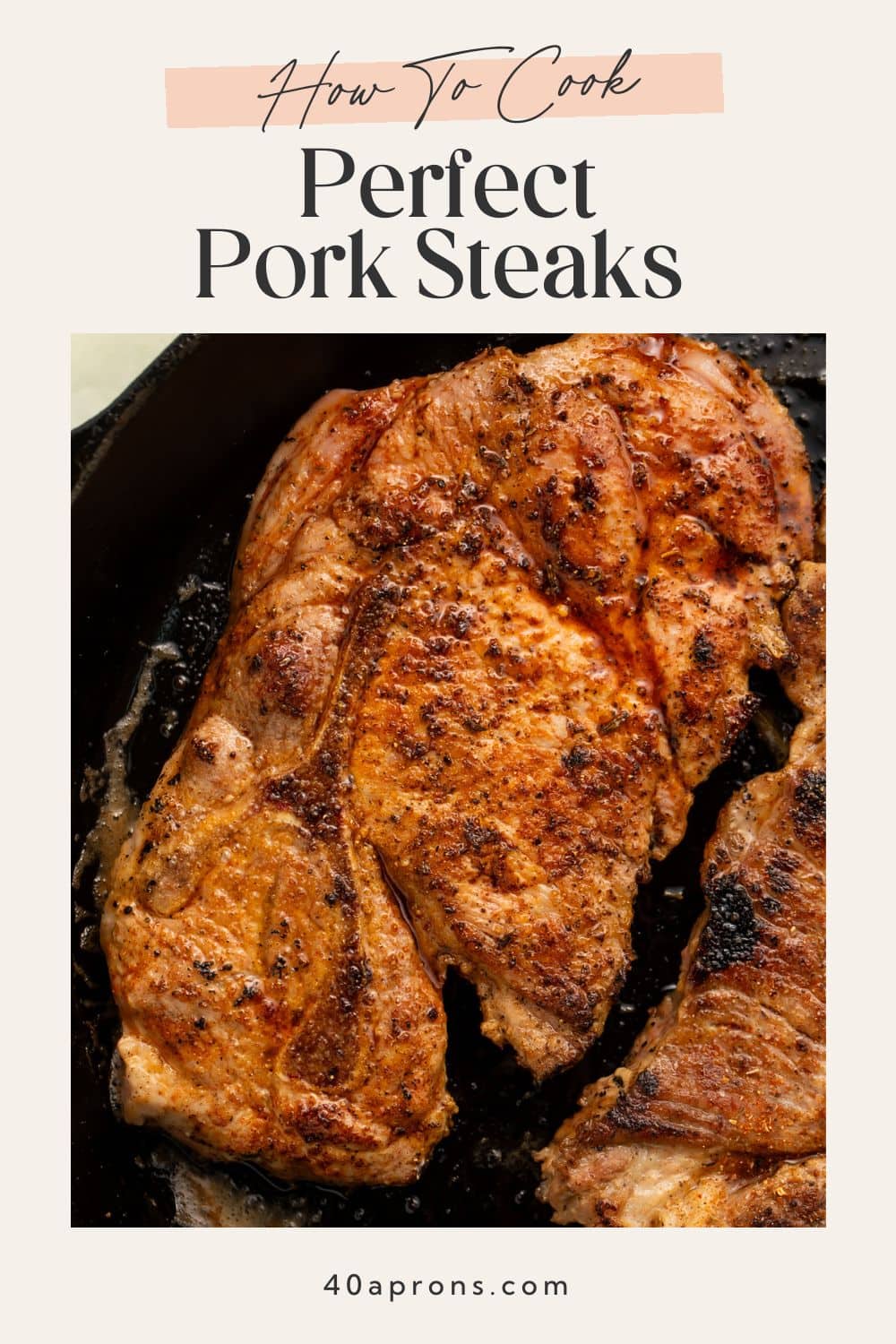 Golden-brown seared pork steaks in black cast iron pan with recipe title overlay