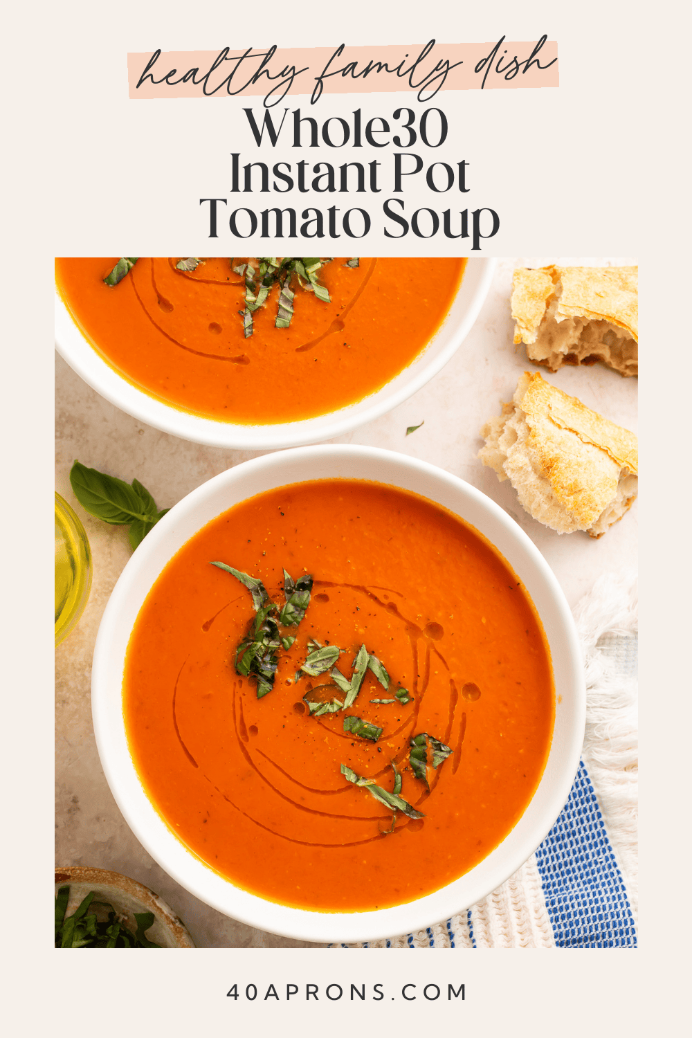 Whole30 Instant Pot tomato soup with coconut cream swirl and fresh basil garnish