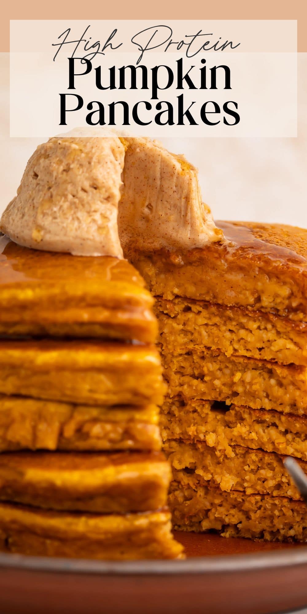 Cut pumpkin protein pancakes showing fluffy interior texture with cinnamon butter on top