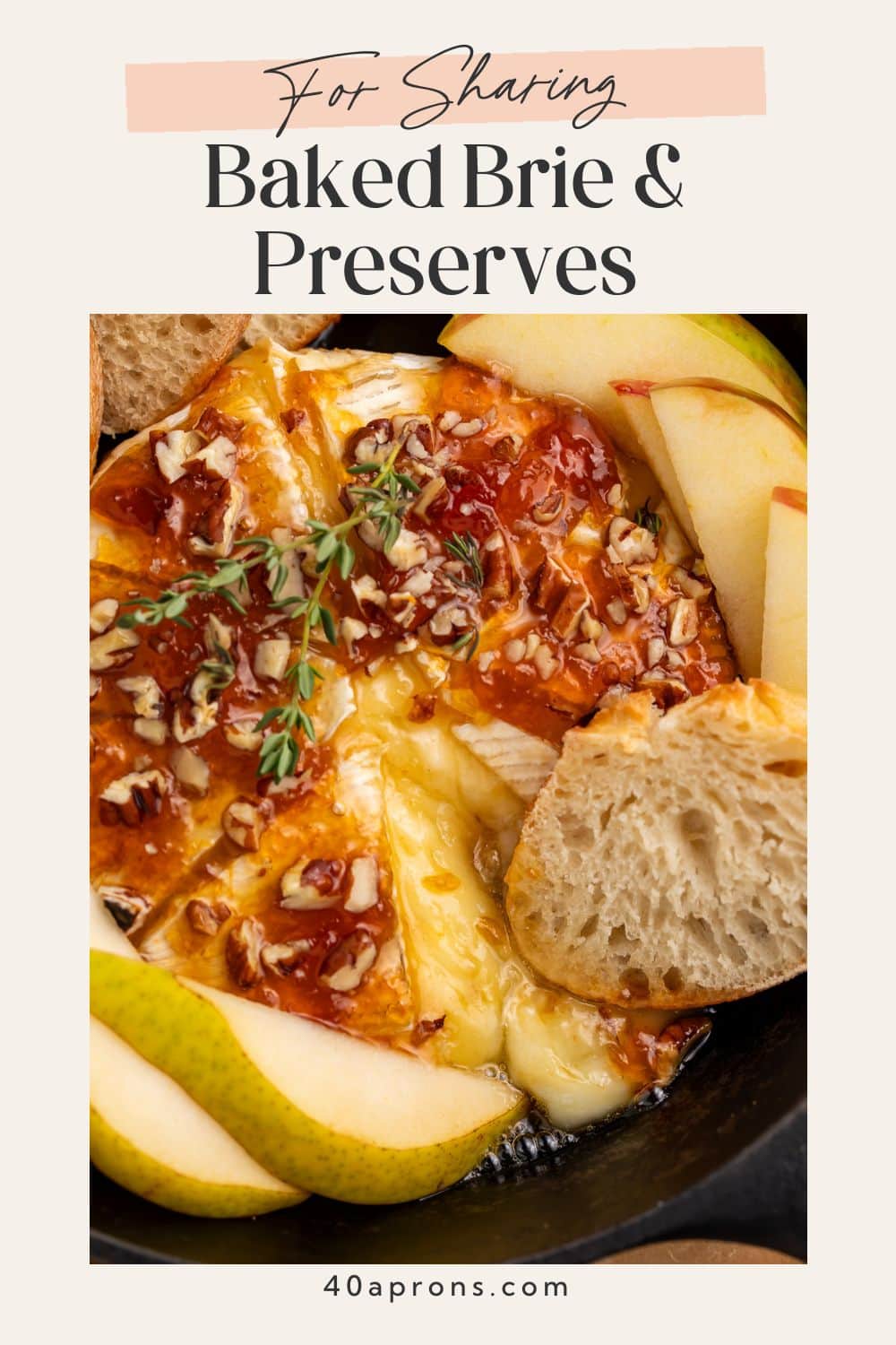 Pinterest graphic showing baked brie with preserves in cast iron skillet with text overlay