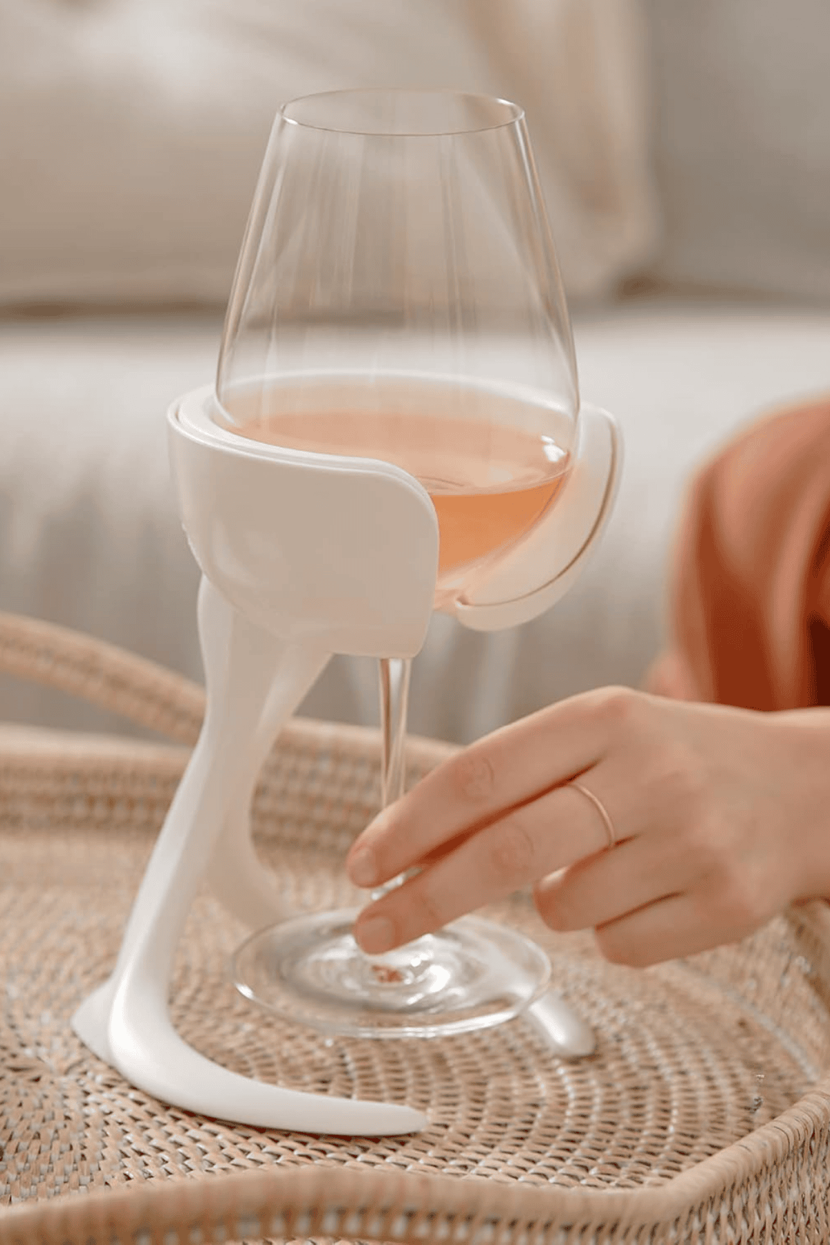 VoChill wine glass chiller in white holding stemmed glass with rosé wine