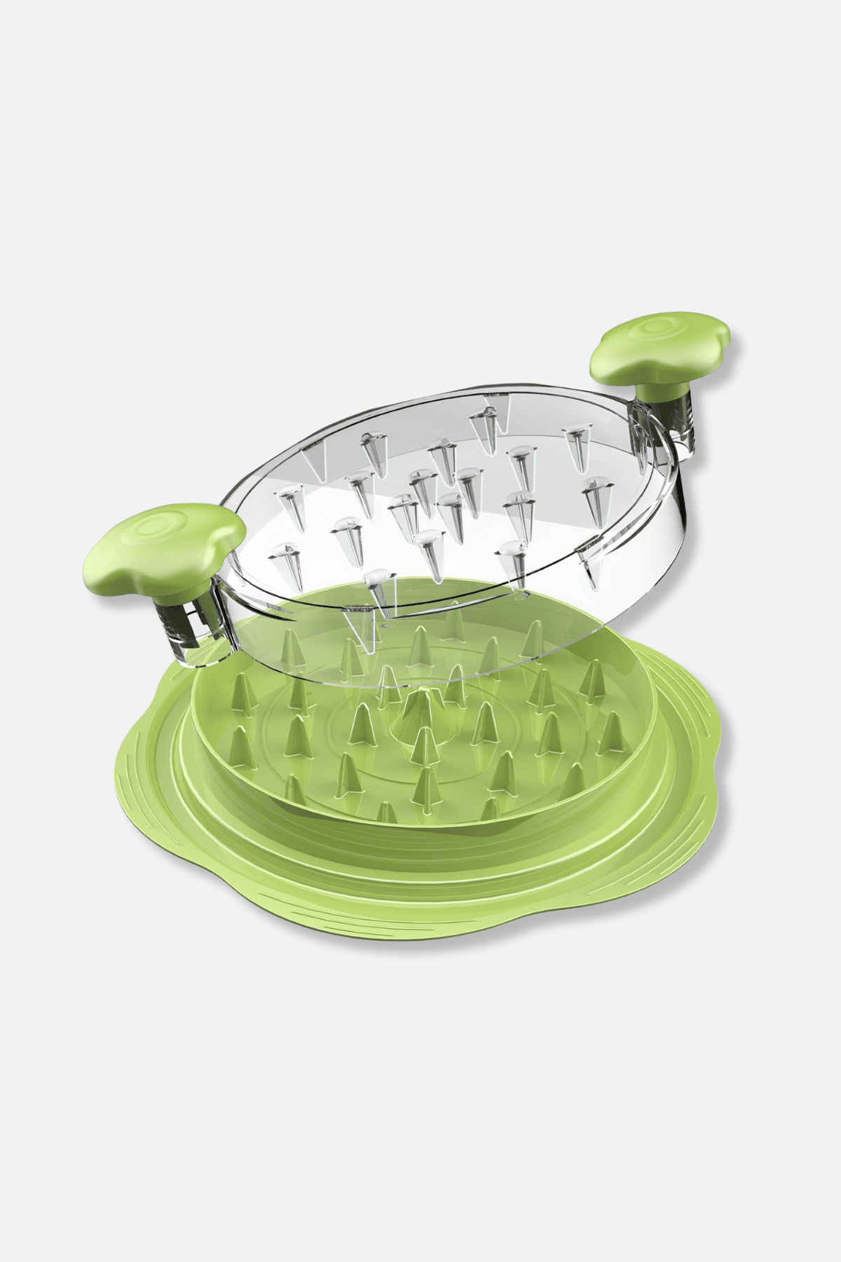 Green meat shredder tool disassembled showing spiked plates and base components