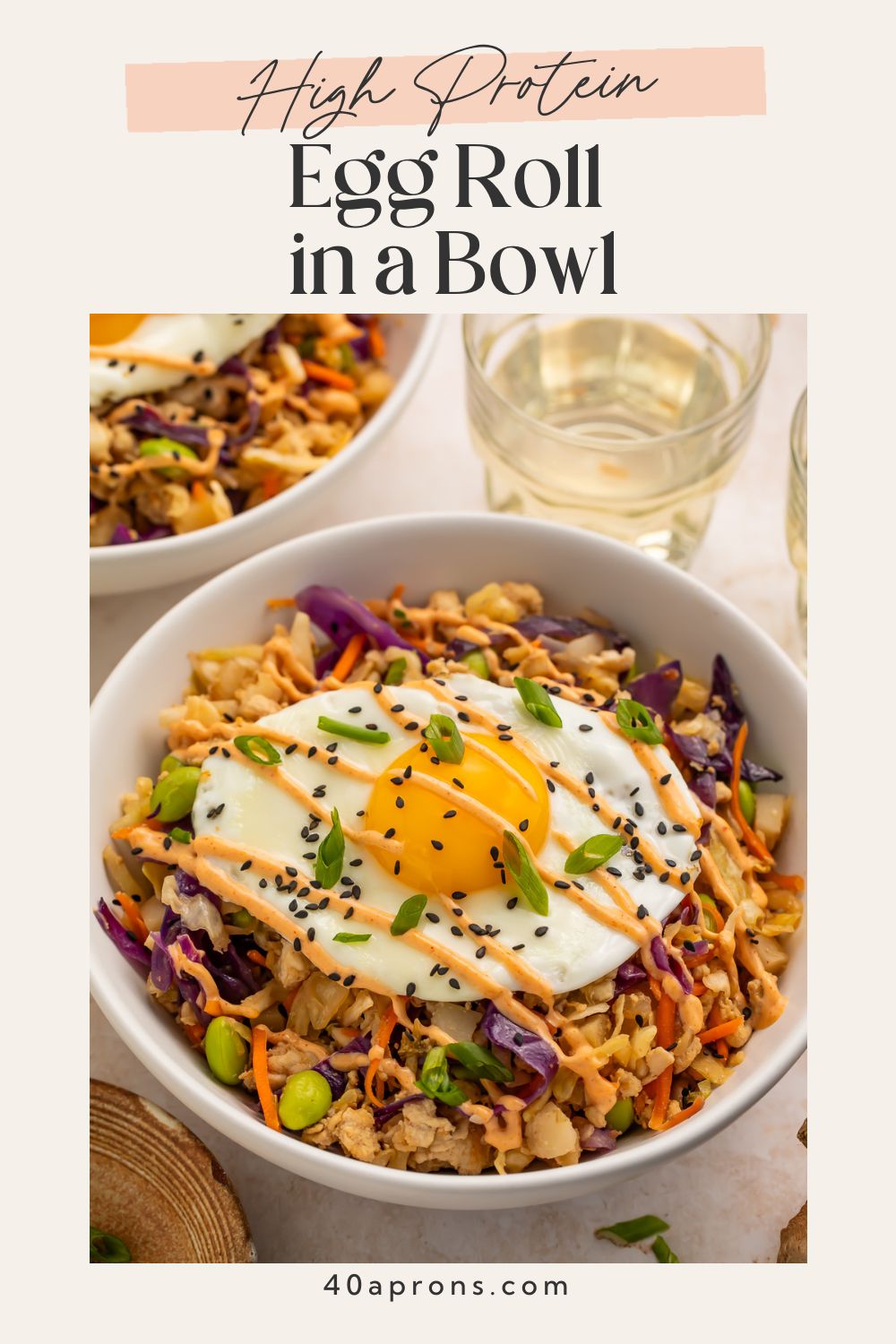 Pinterest pin showing high protein egg roll in a bowl with fried egg and vegetables
