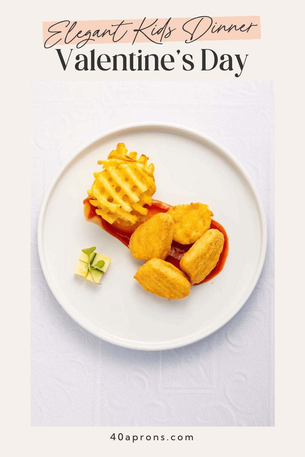 Pinterest pin for elegant kids Valentine's dinner showing chicken nuggets arranged on ketchup swoosh with stacked waffle fries and cheese cube garnish