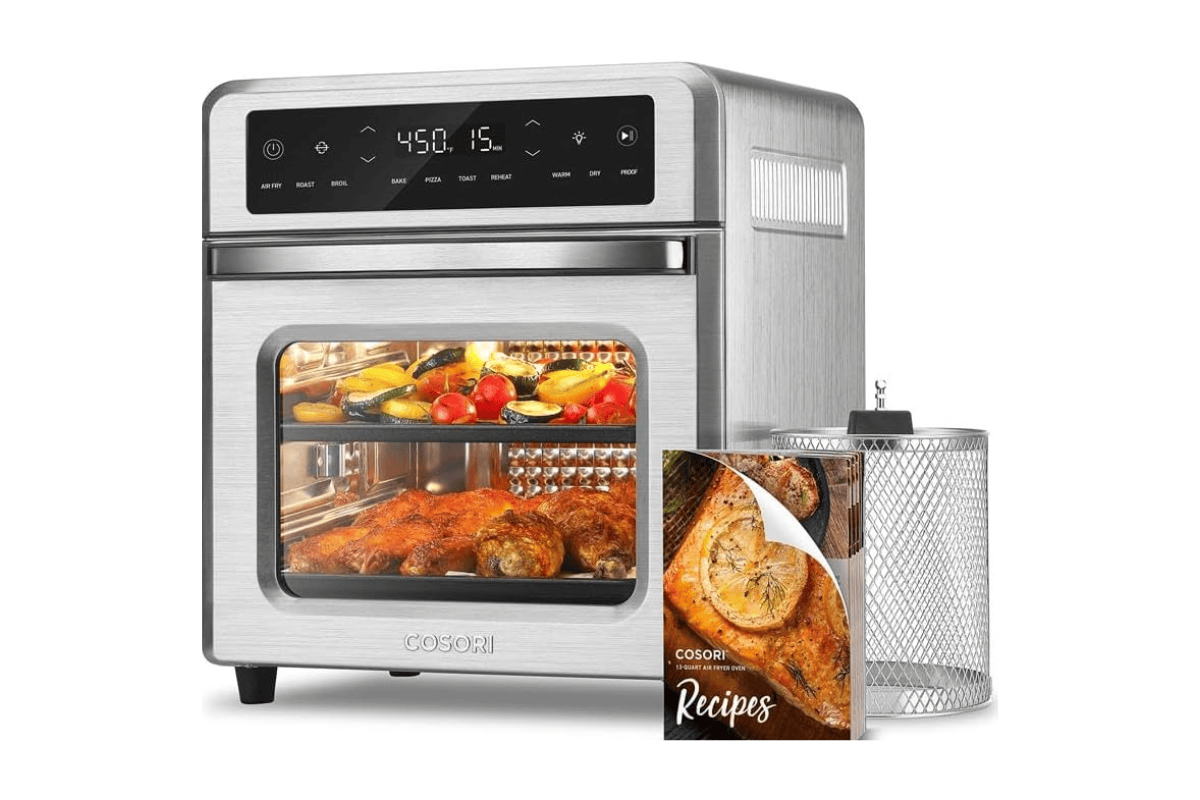 Stainless steel COSORI air fryer oven with roasted vegetables and chicken visible inside